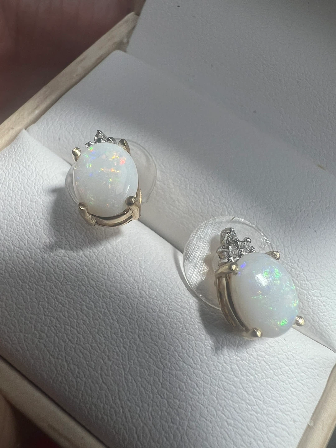 14 k Opal stud earrings with diamonds