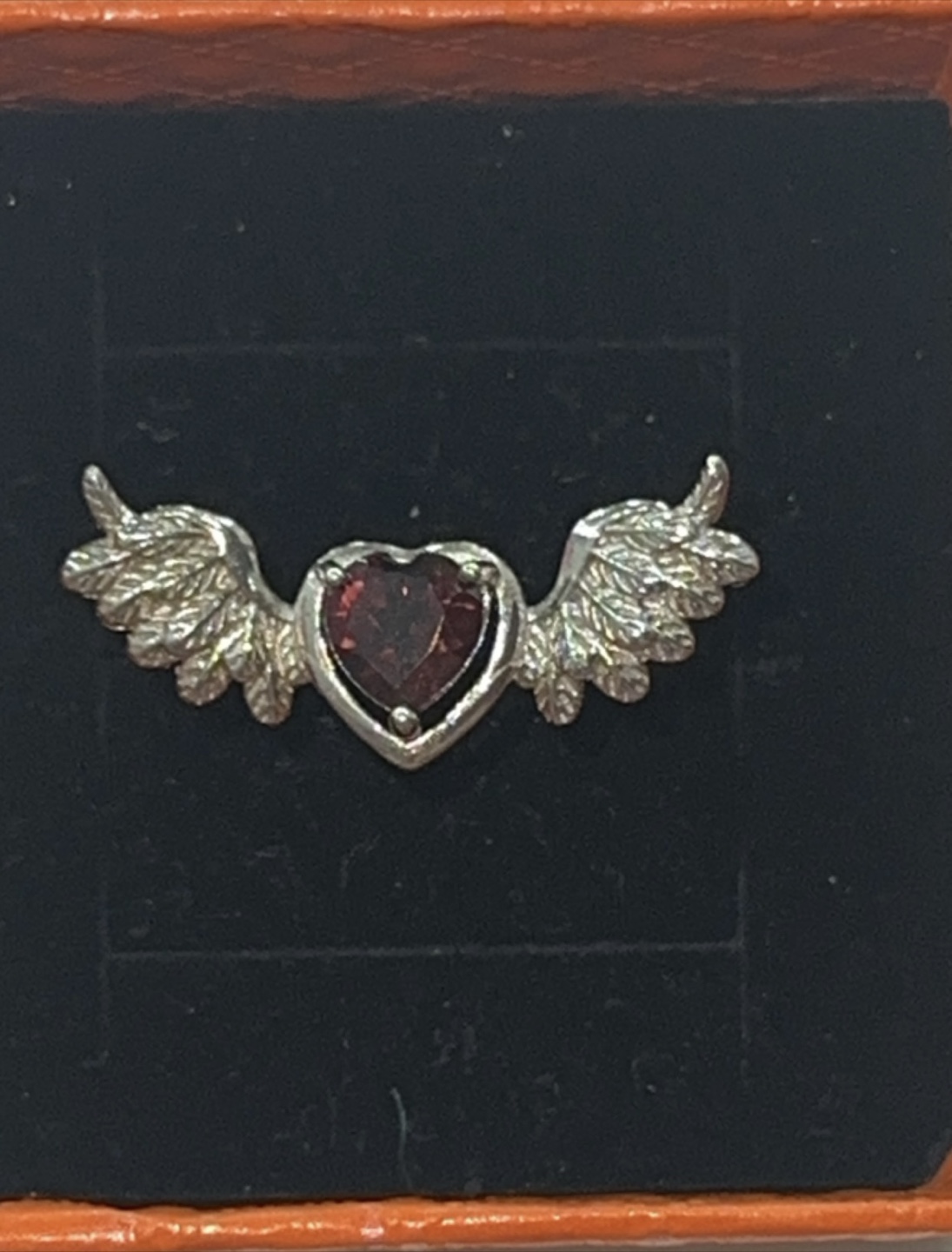 Garnet heart with wings
