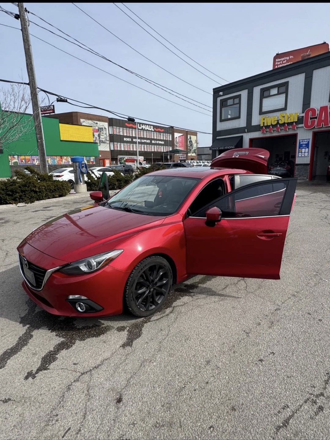 Red Mazda 3 Sedan