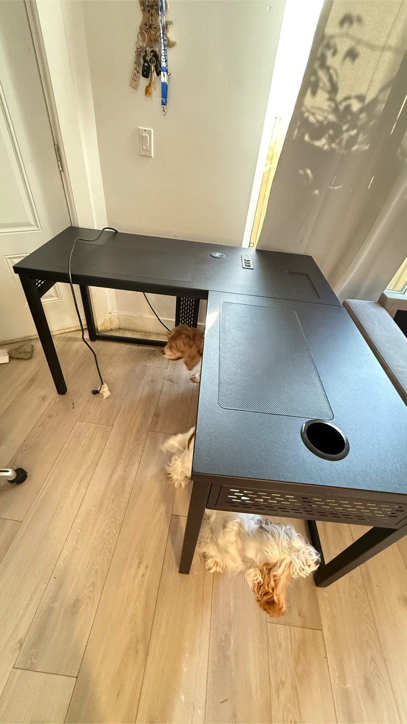 Black L-Shaped Gaming Desk with Power Outlets