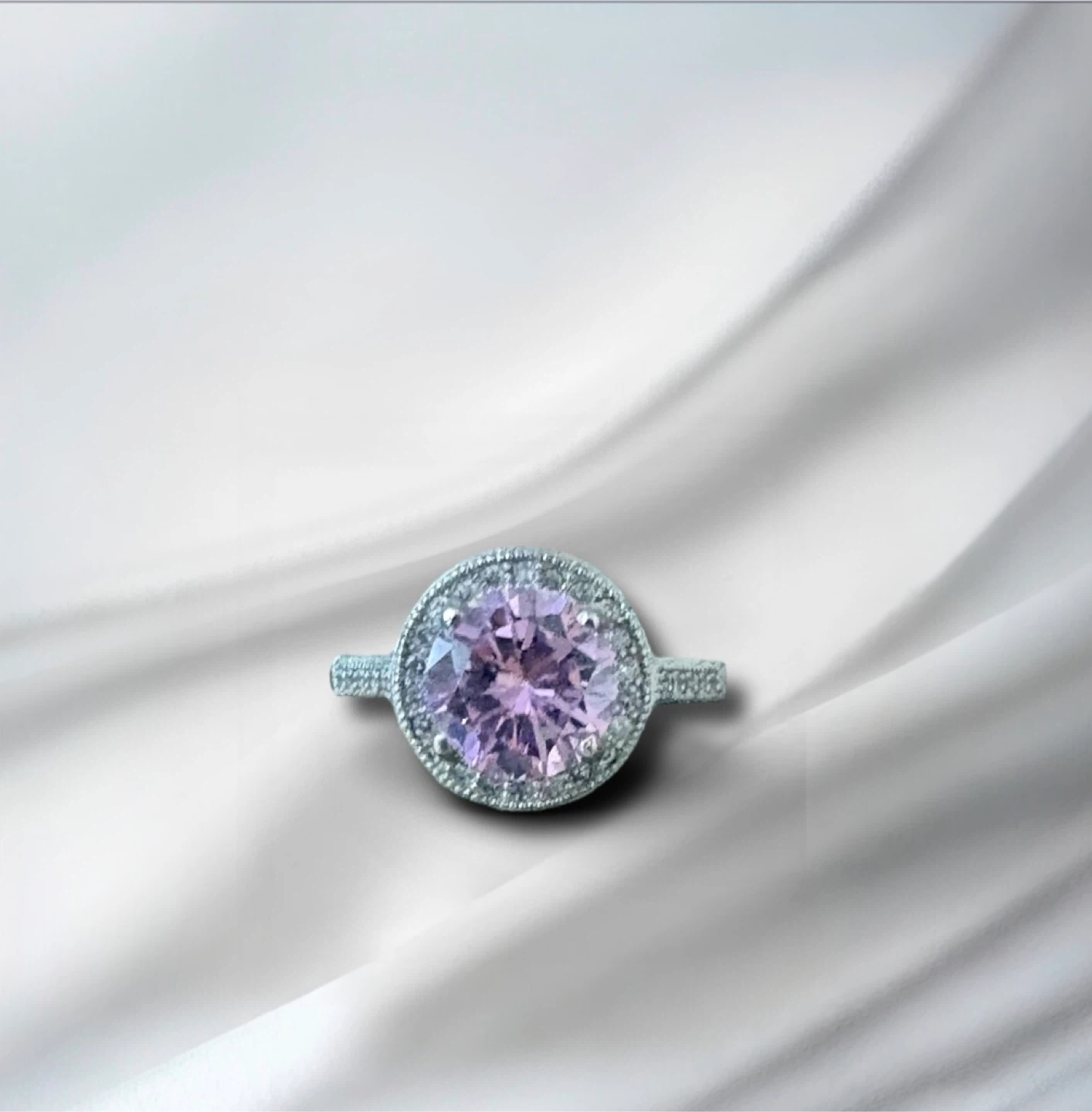 Sterling Silver Pink Sapphire and CZ Halo Ring