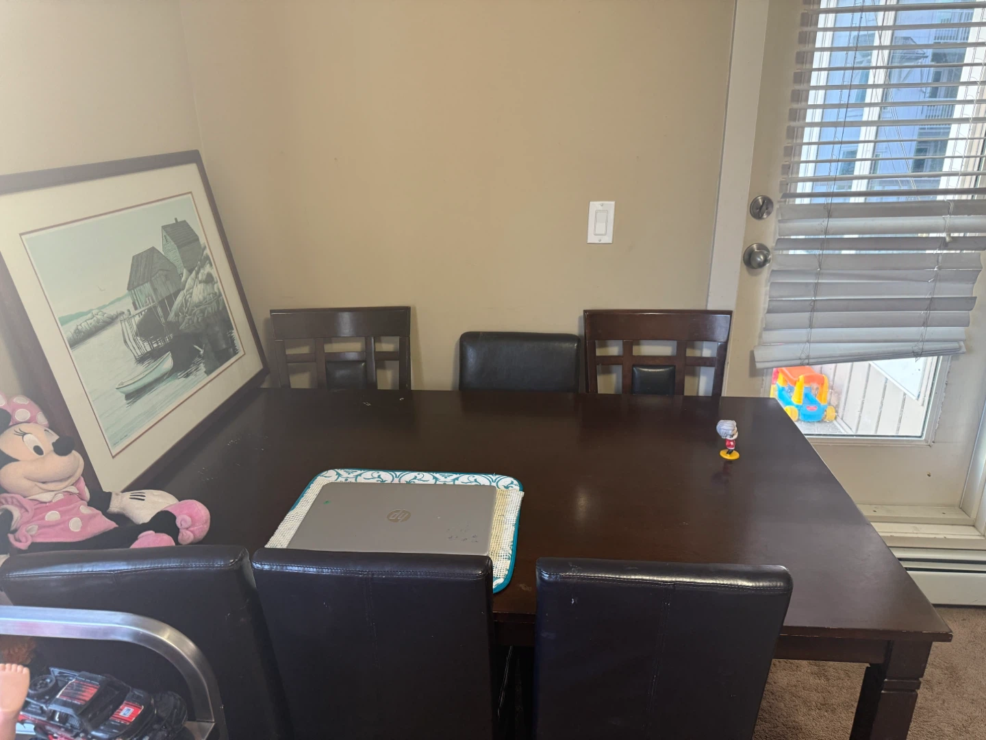 brown dinning table with 6 chairs