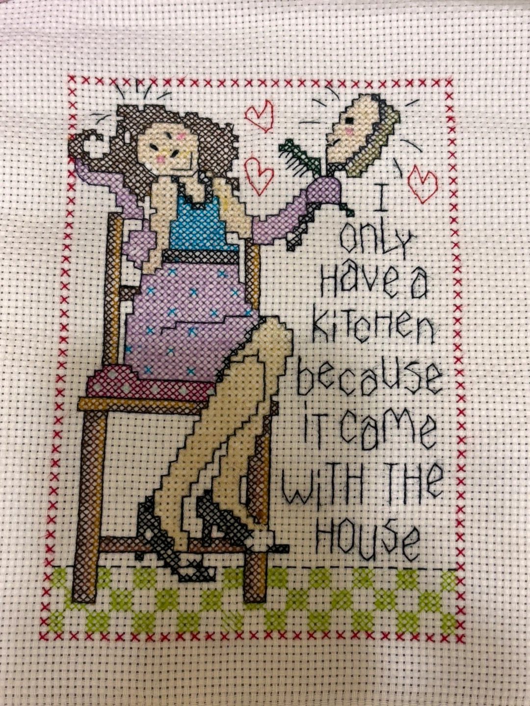 Knitted doll for framing