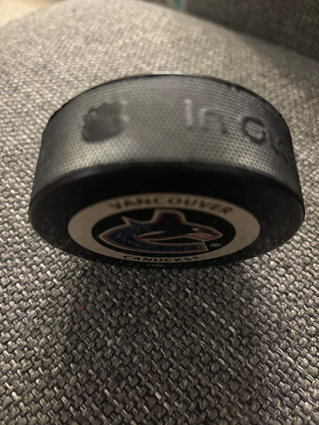 Official Canucks game puck (early 2000s) - photo 3