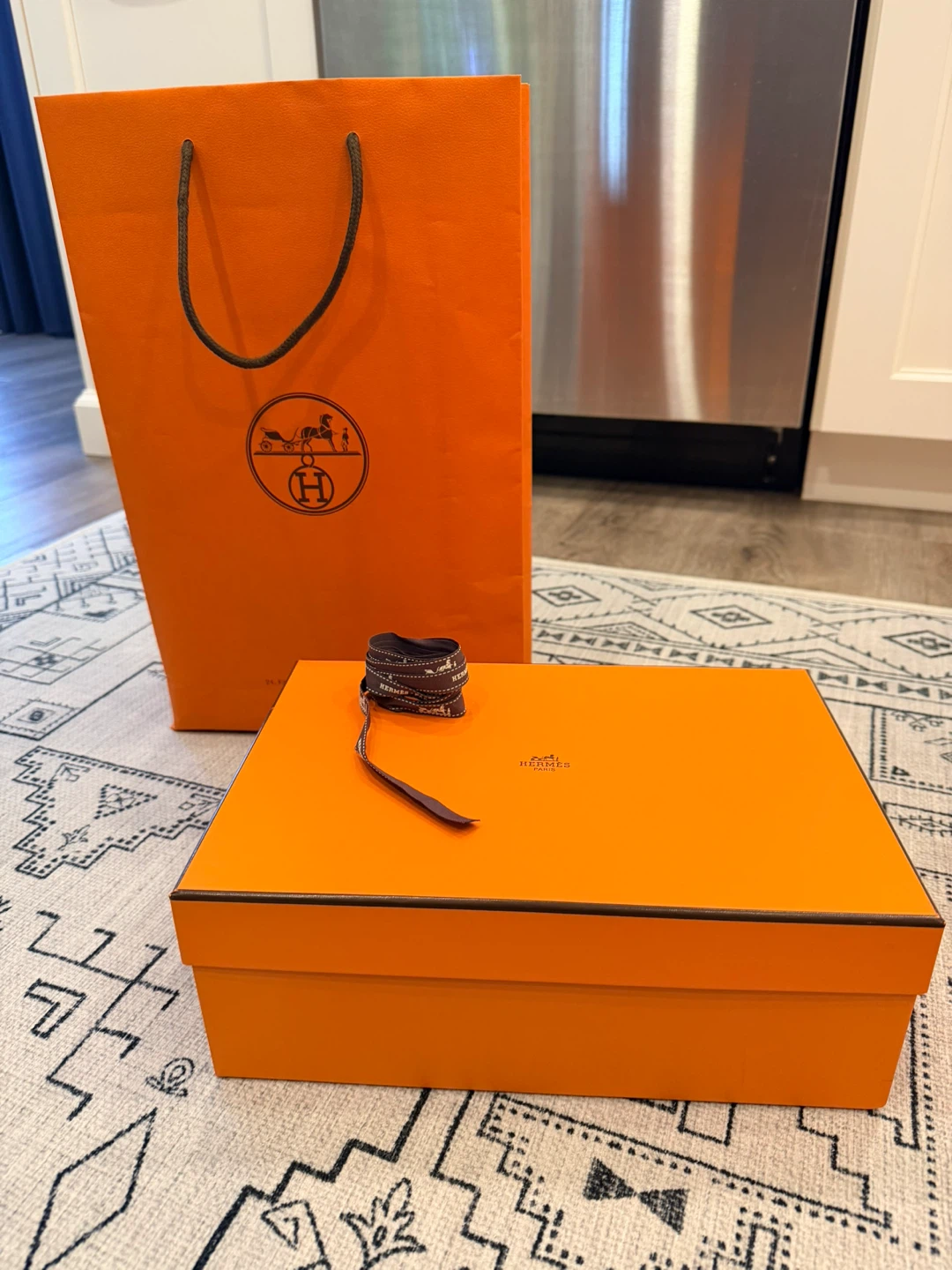 Hermès gift bag, box, and ribbon