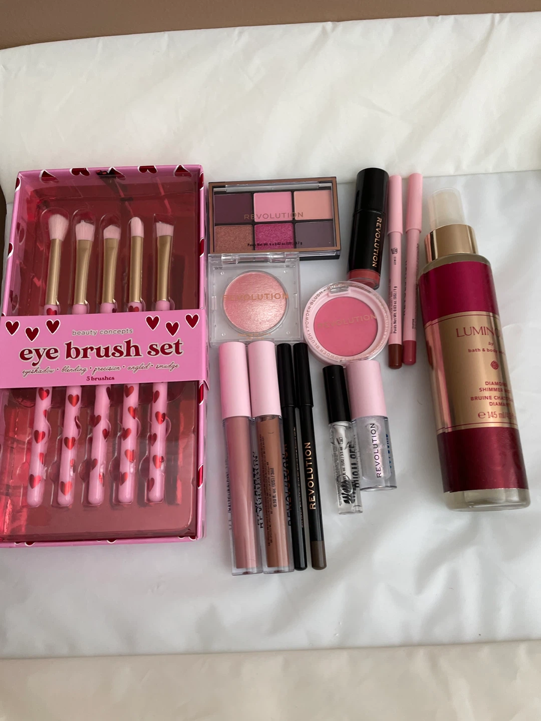 Assorted make up and perfume and lotion