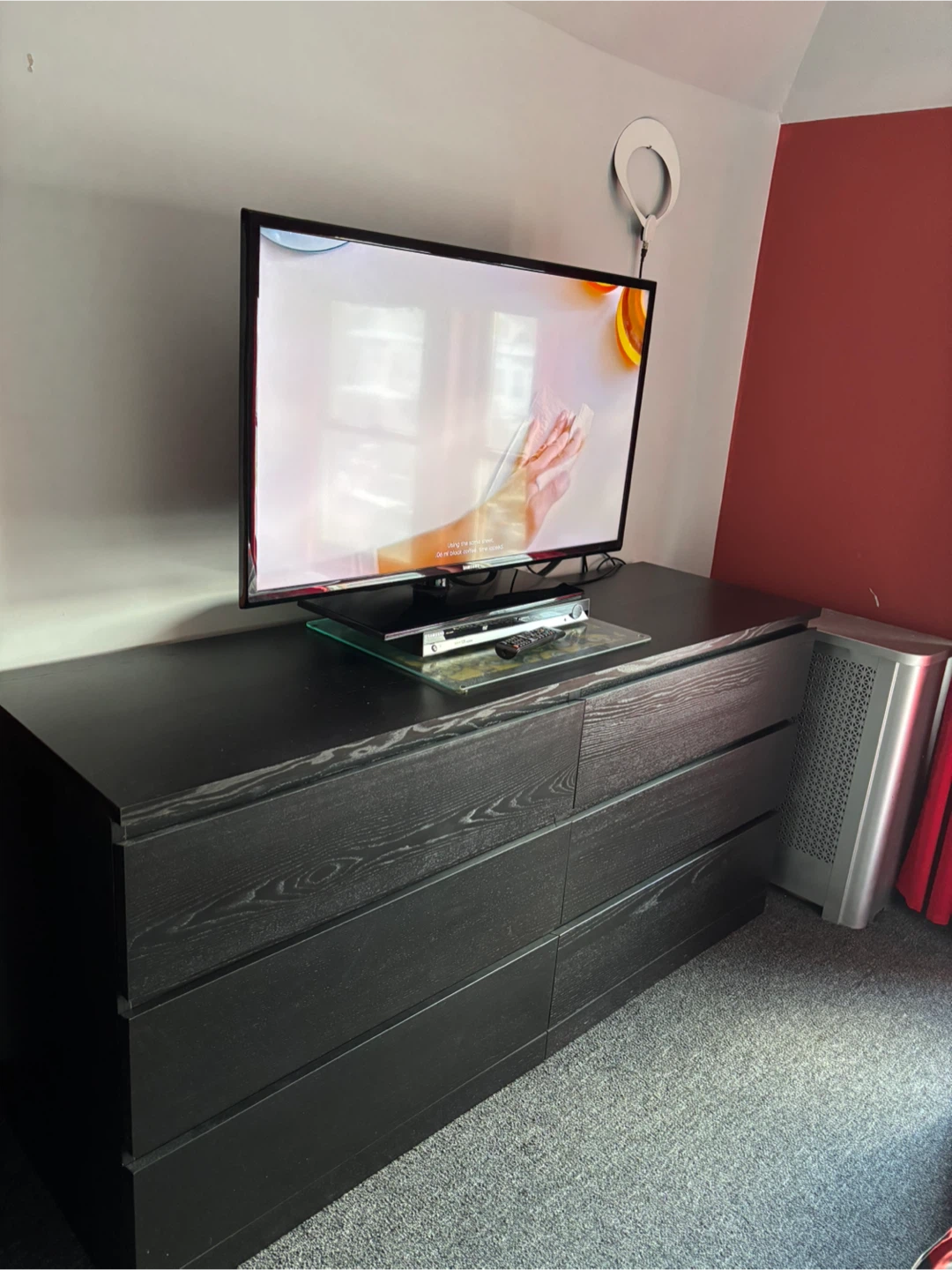 Black TV with Dresser