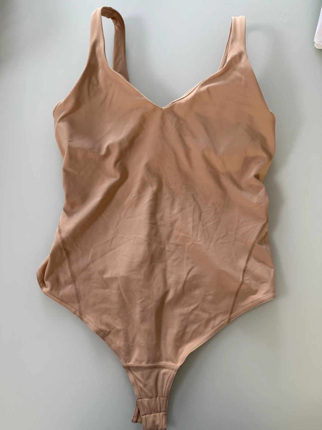 Lululemon Nulu Bodysuit (never worn)- Size 10