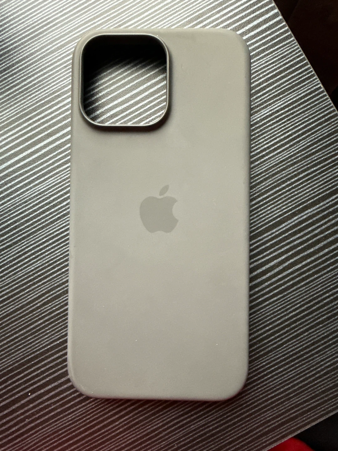 Selling the official Apple silicone case in Stone Gray