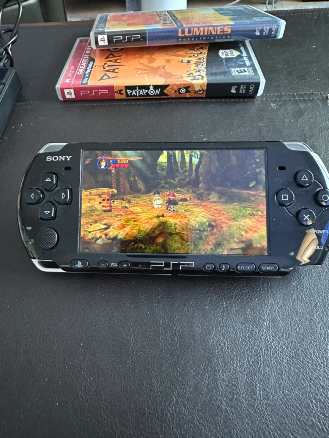 Sony PSP 3001 + new batteries/charger + 3 games - photo 3