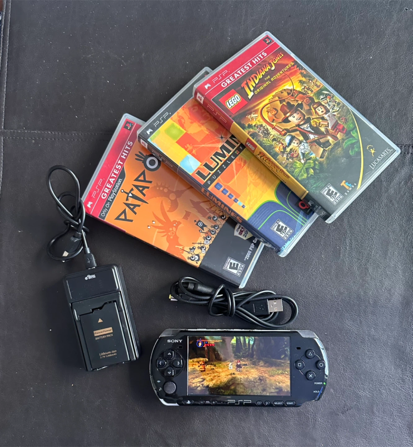 Sony PSP 3001 + new batteries/charger + 3 games