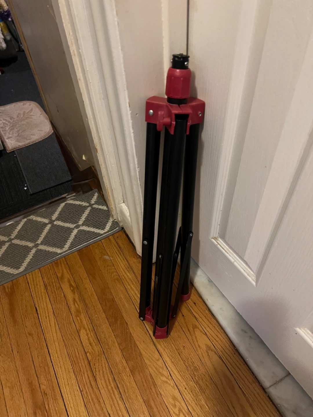Black and Red Tripod Stand