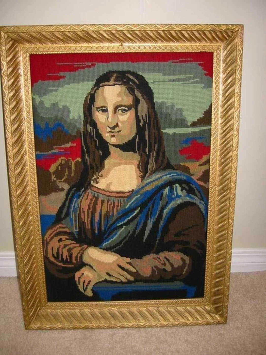 1800s picture frame with 28” by 22”  Mona Lisa needlepoint