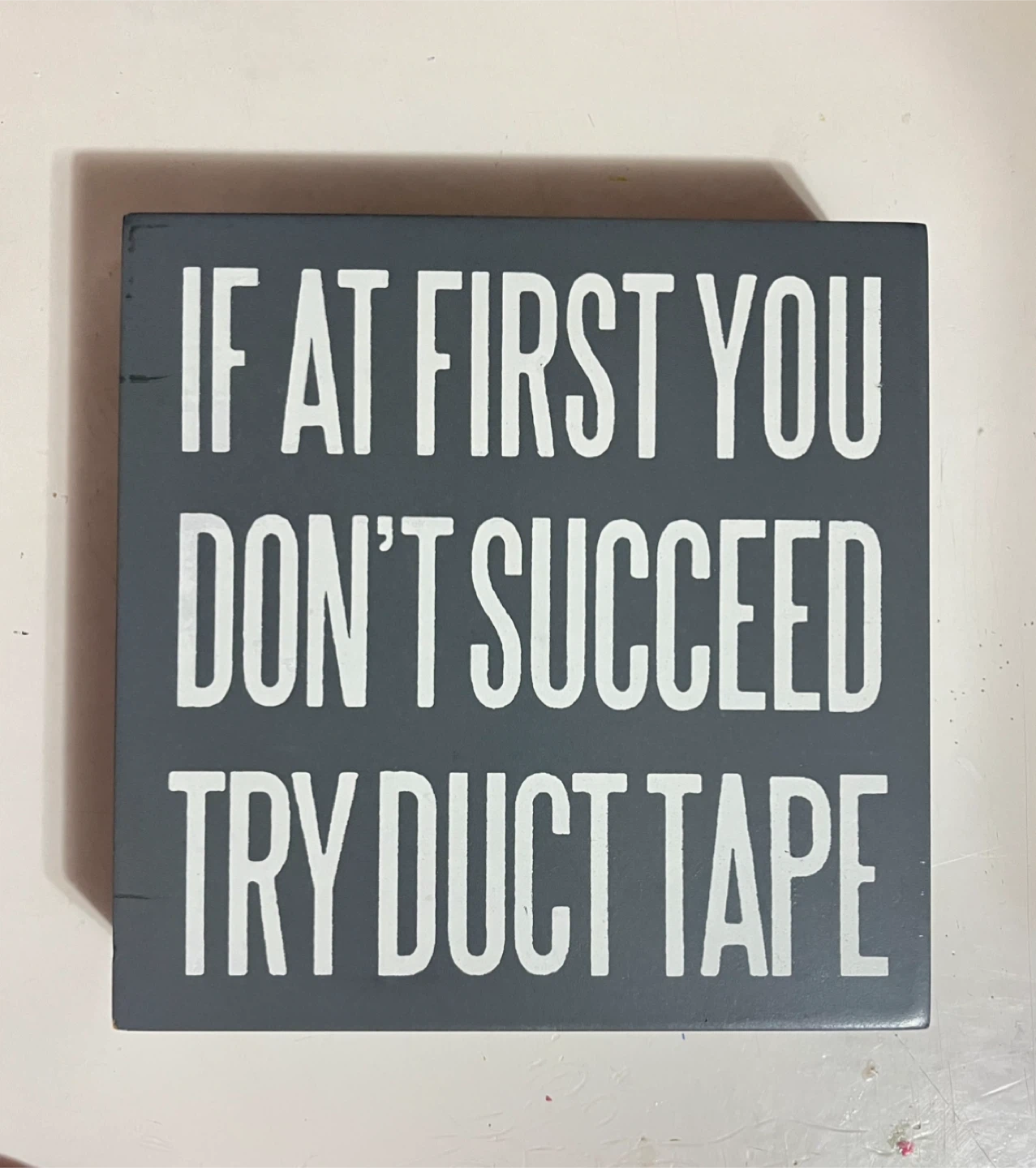 “If at first you don’t succeed try duct tape” Bookshelf Decor
