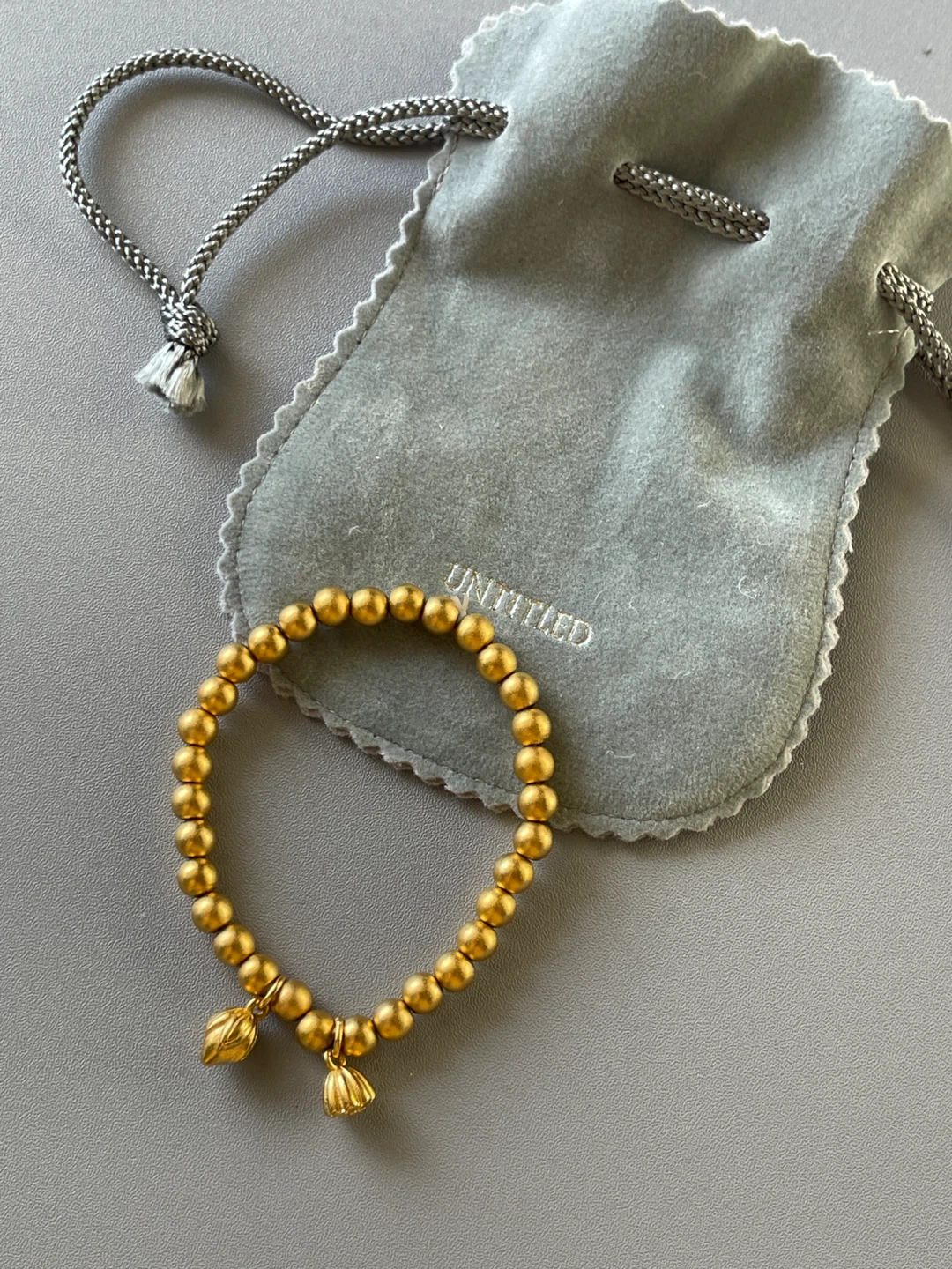Gold Colour Beaded Bracelet with Lotus Charms