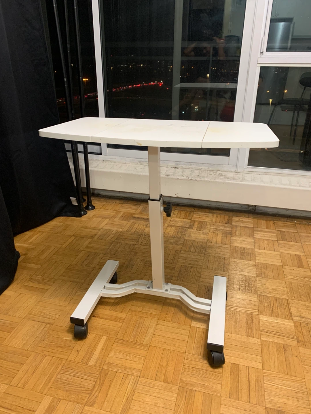Adjustable White Rolling Table