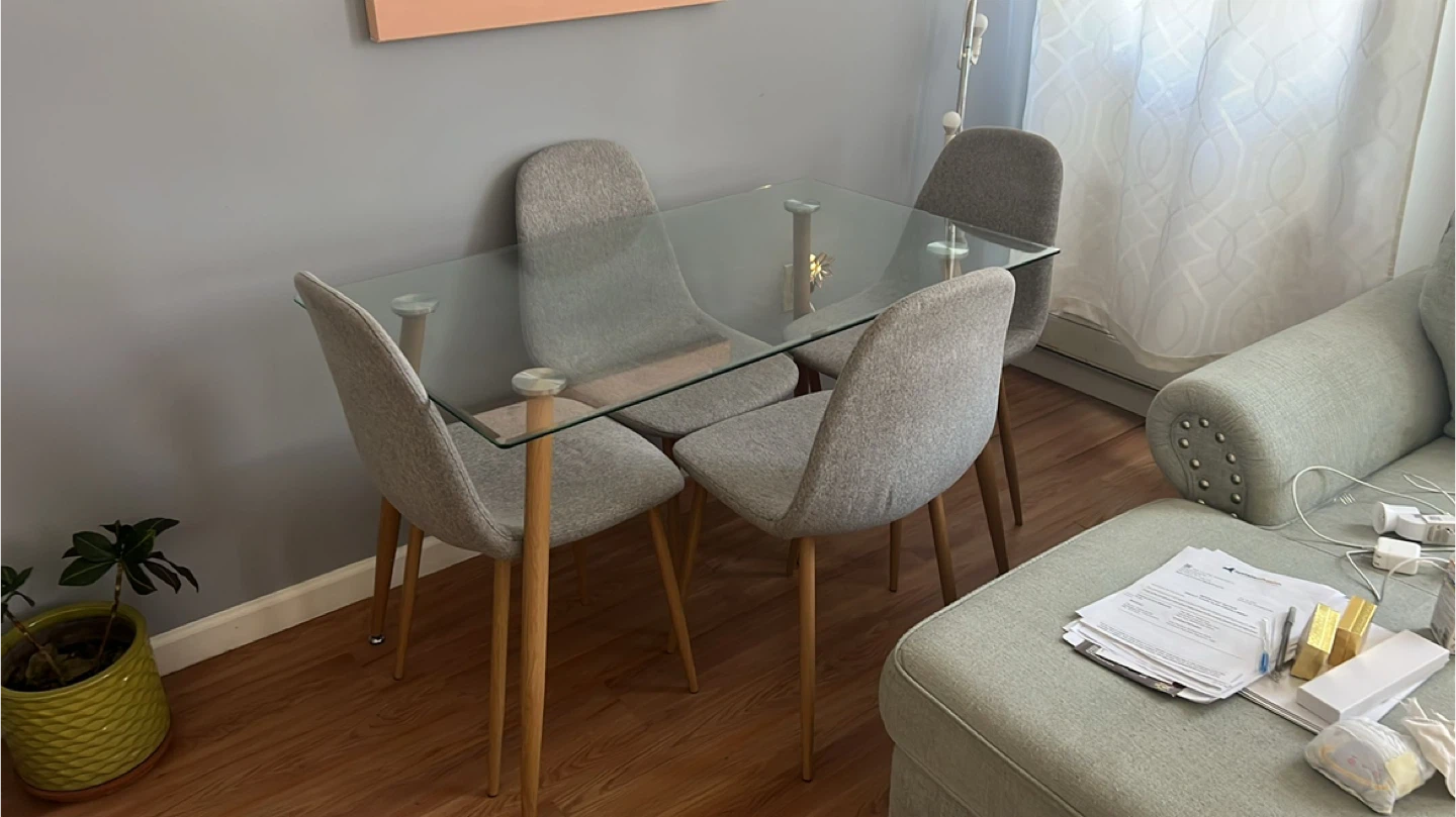 Glass Top Dining Table with 4 Gray Chairs
