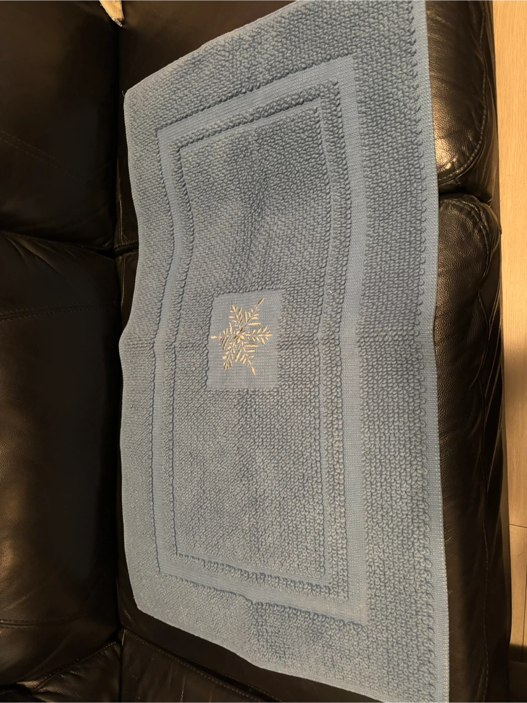 Blue Bath Mat with Snowflake Design