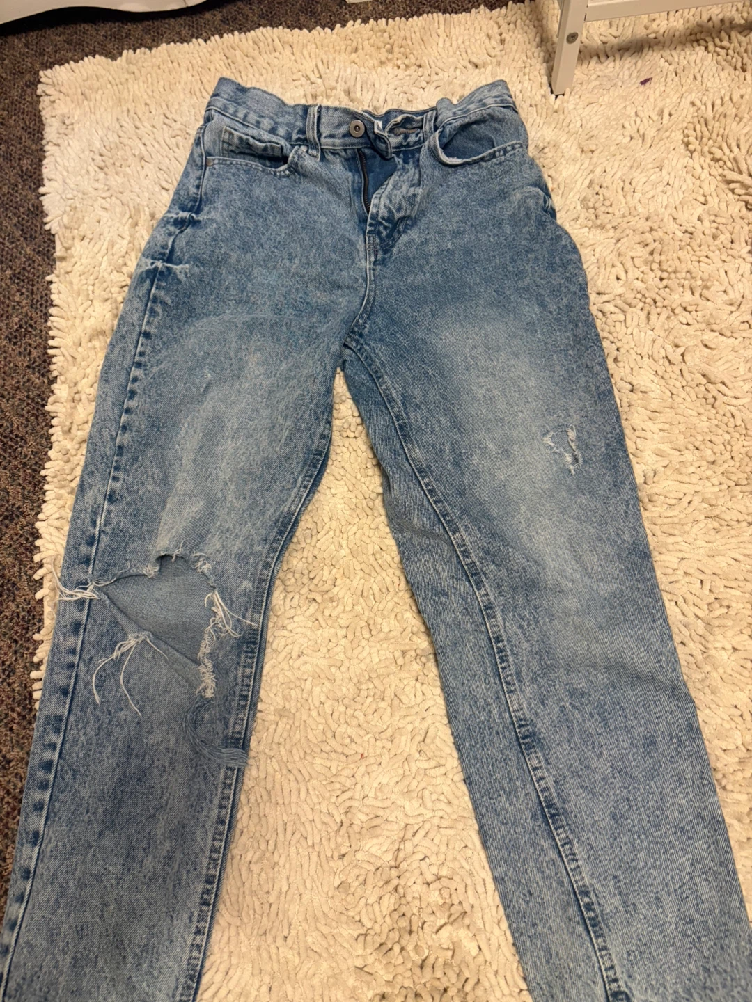 Distressed Light Wash Denim Jeans