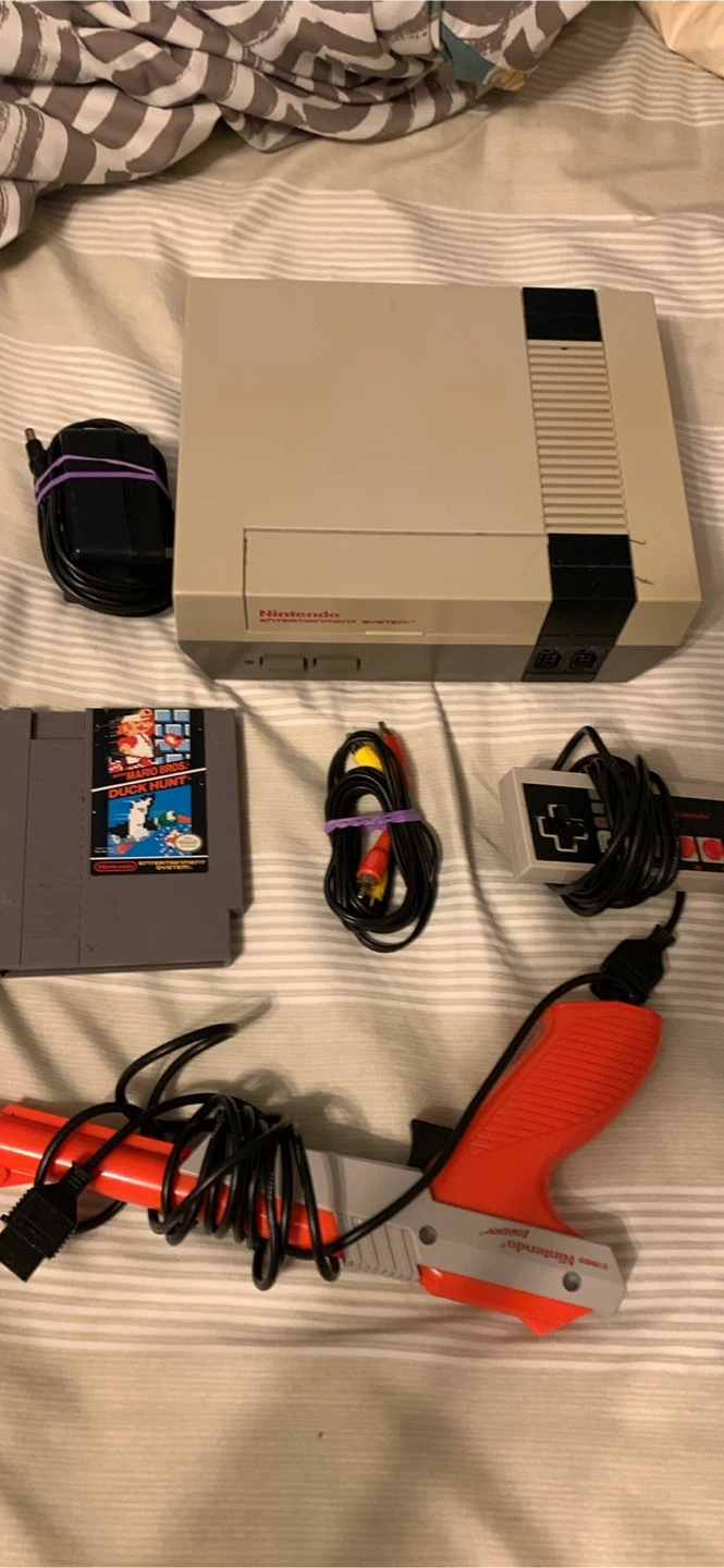 NES Nintendo entertainment system with controller and cords