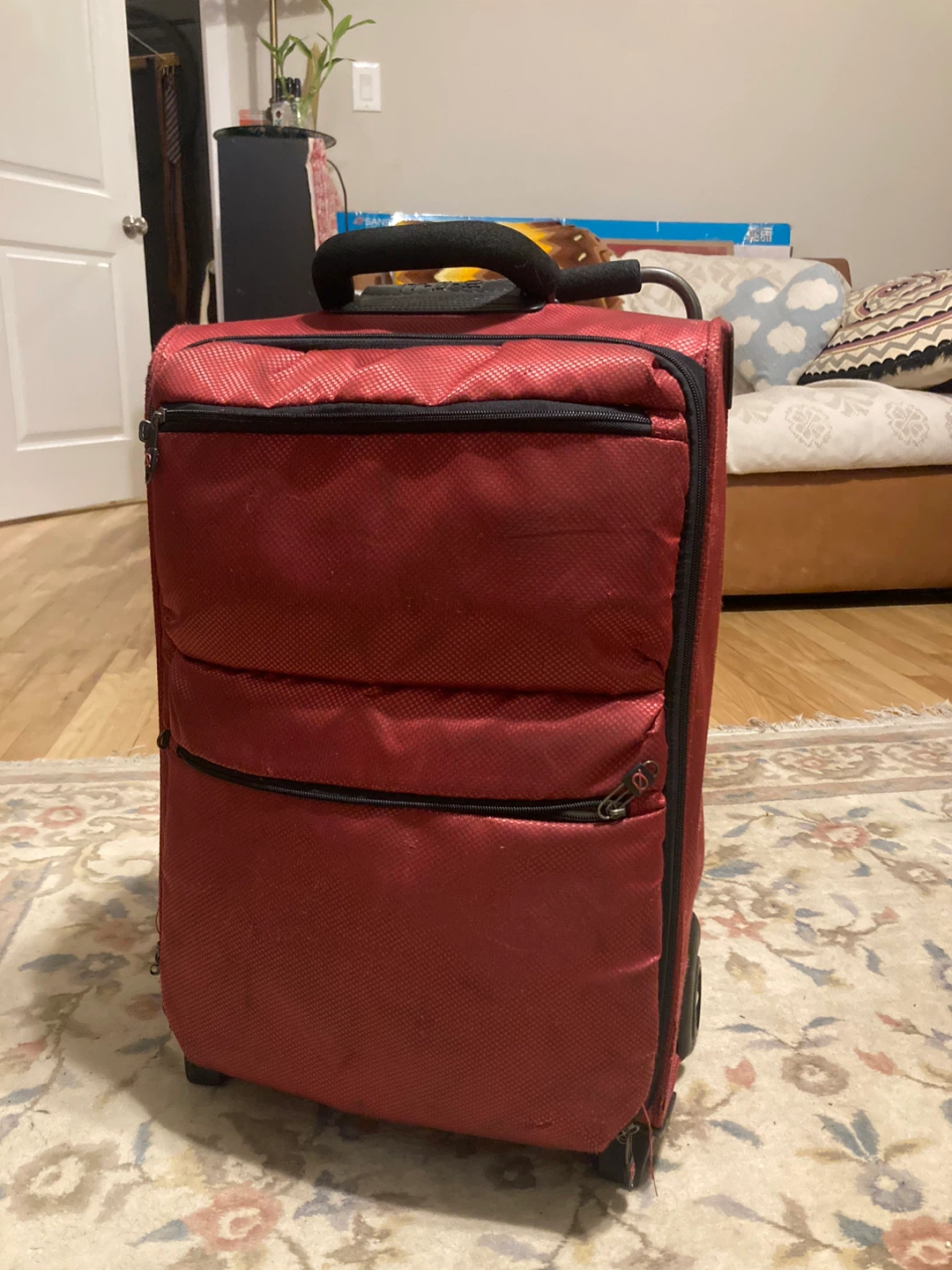 Red Rolling Suitcase