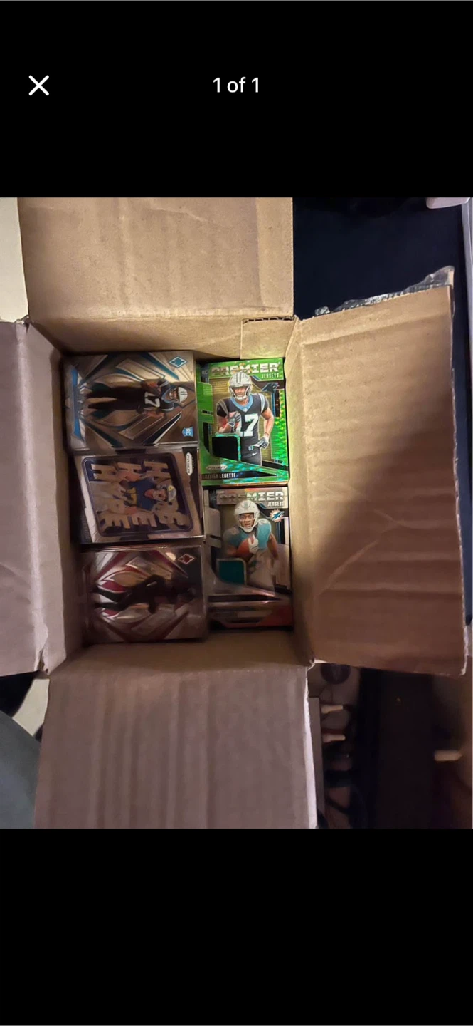 Box of nfl prizm football cards