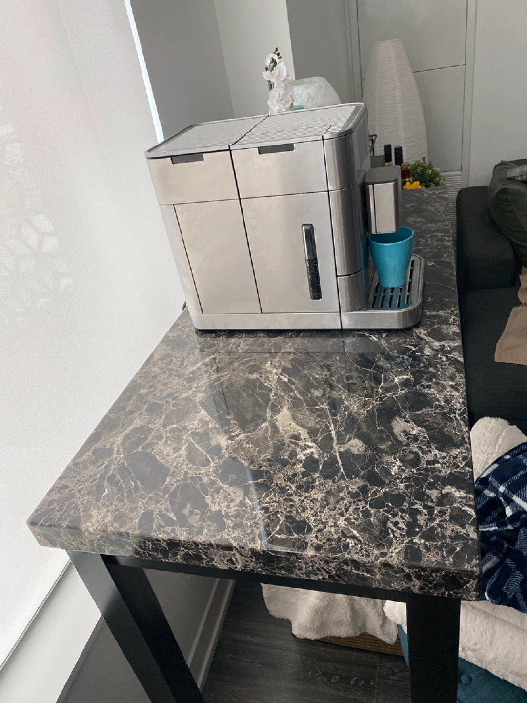 Marble top bar table with black legs