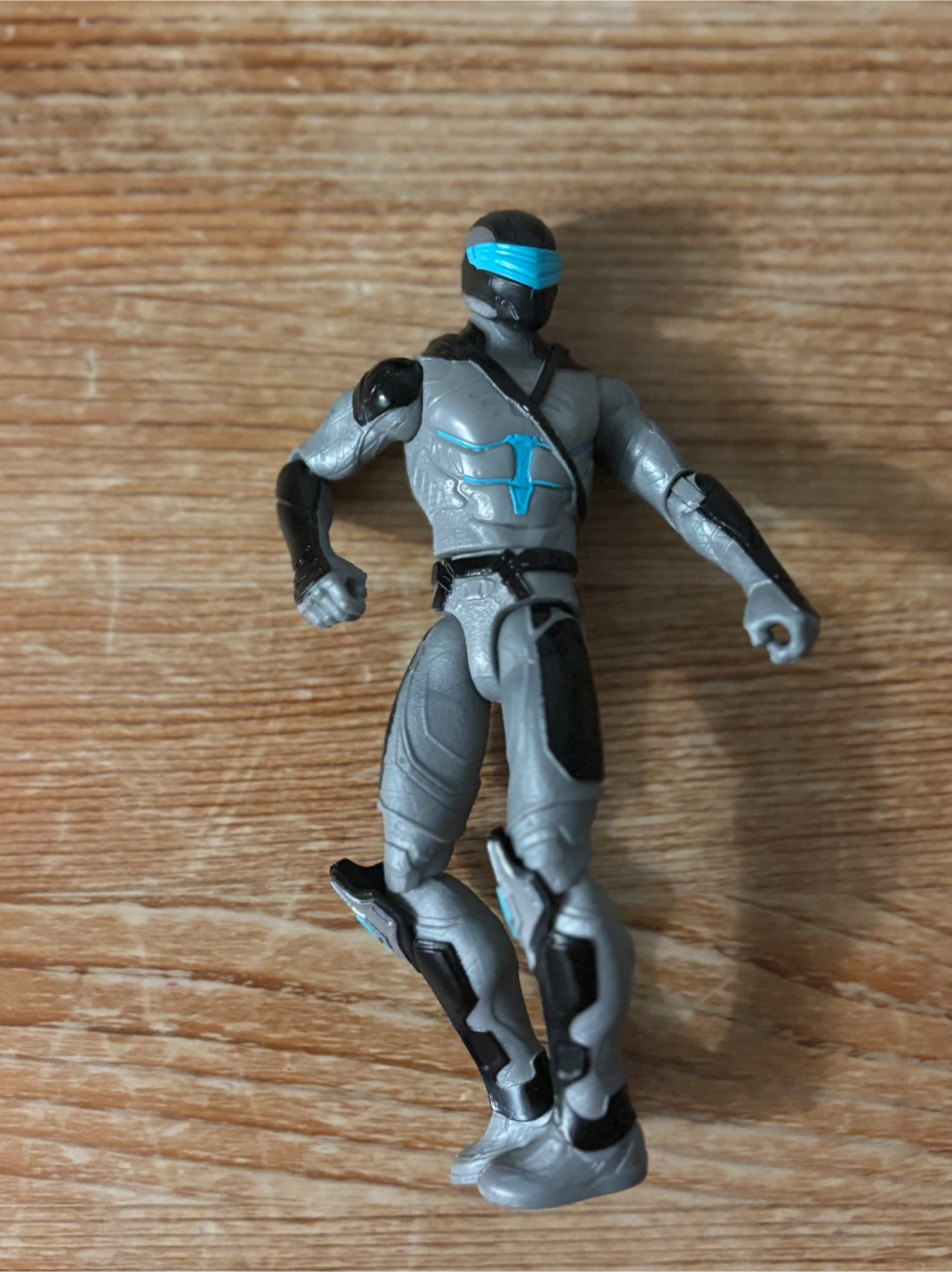 Grey Action Figure with Blue Visor