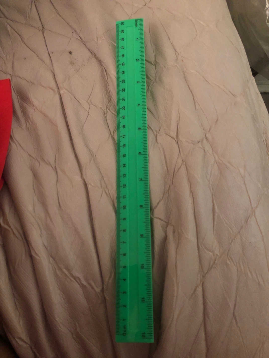Green Plastic Ruler with Inch and Centimeter Markings