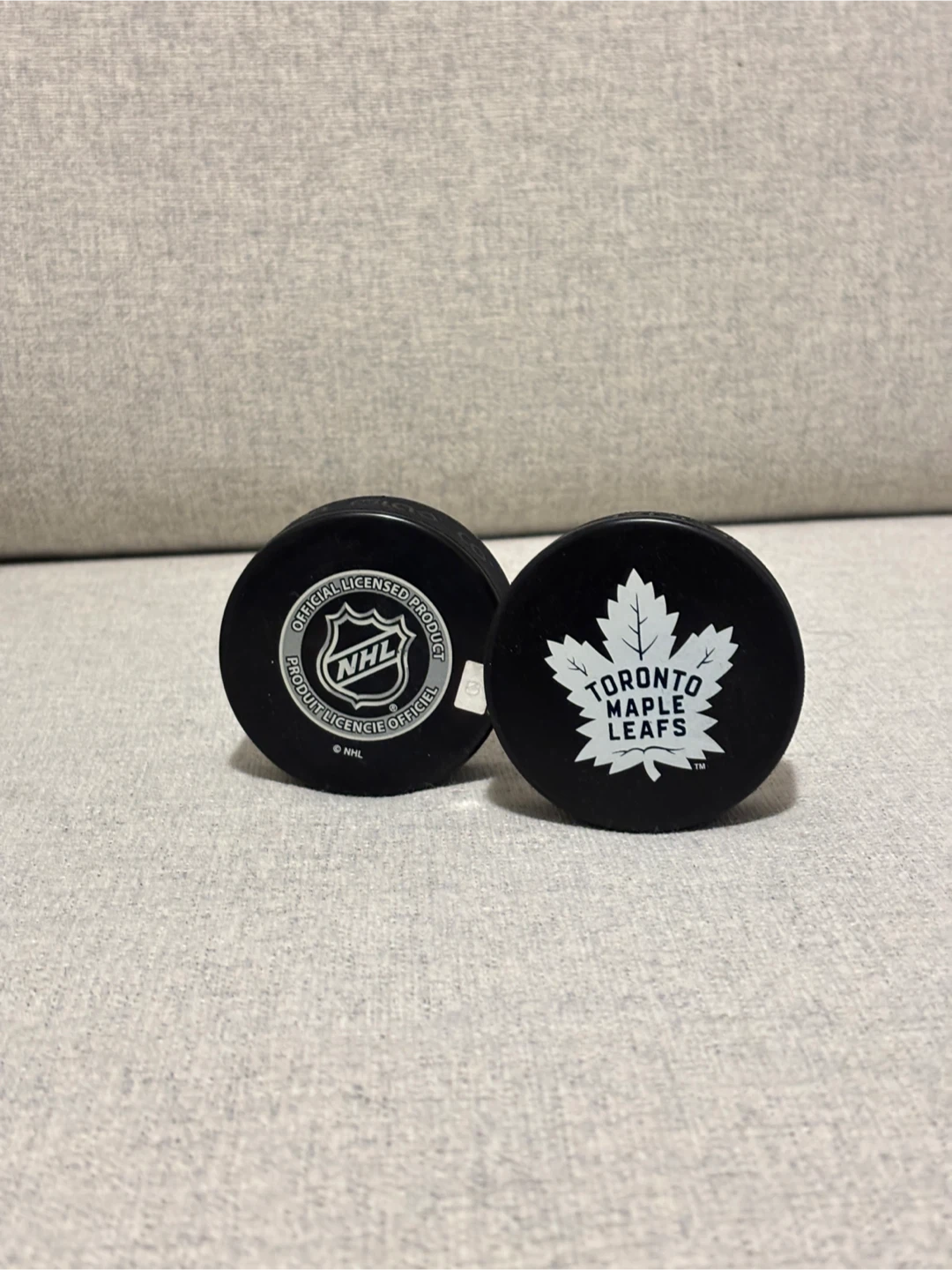 2x Toronto Maple Leafs Hockey Pucks