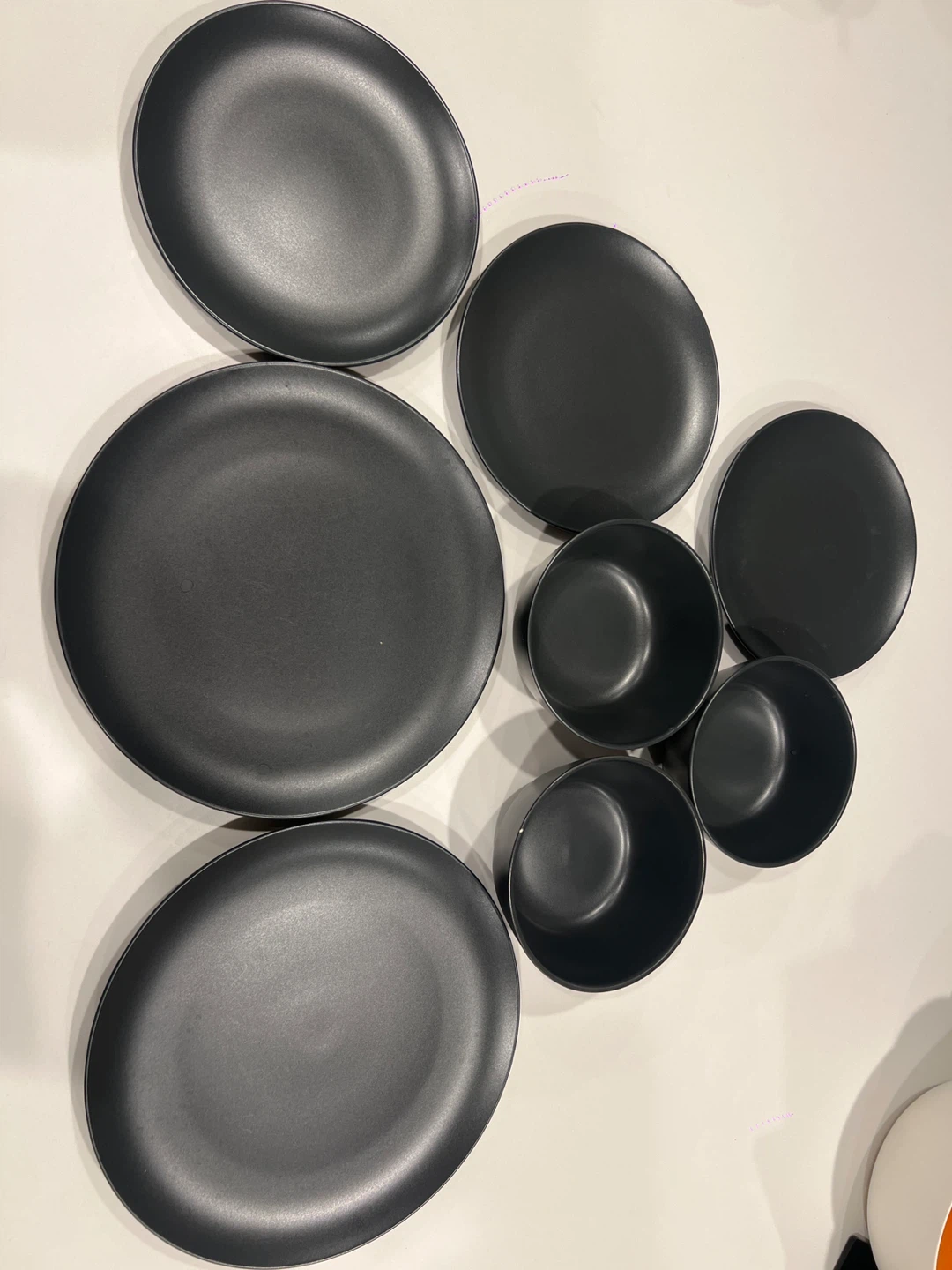 Set of 5 Black Plates and 3 Bowls