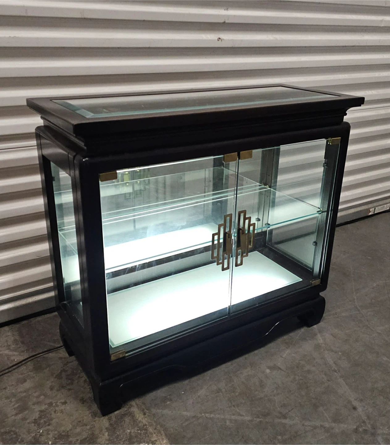 Beautiful Mahogany glass display cabinet with adj shelves