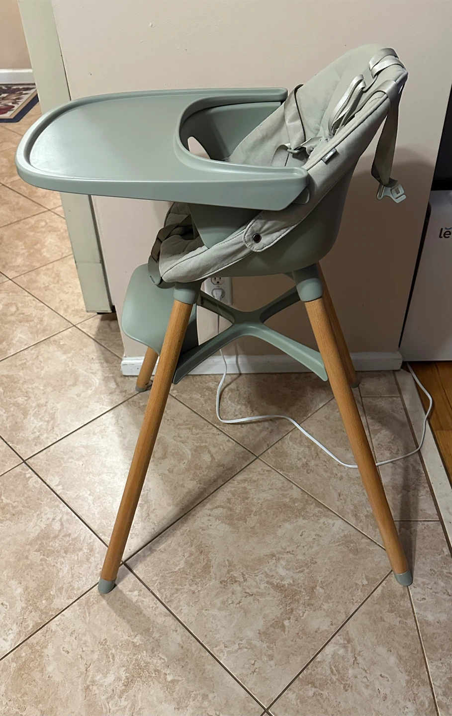 Lalo green high chair with wooden legs