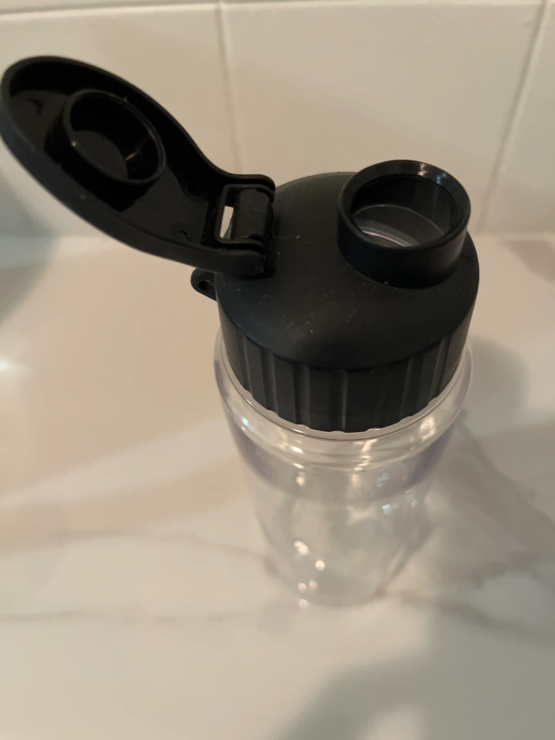 Clear Plastic Water Bottle with Black Flip-Top Lid - photo 2