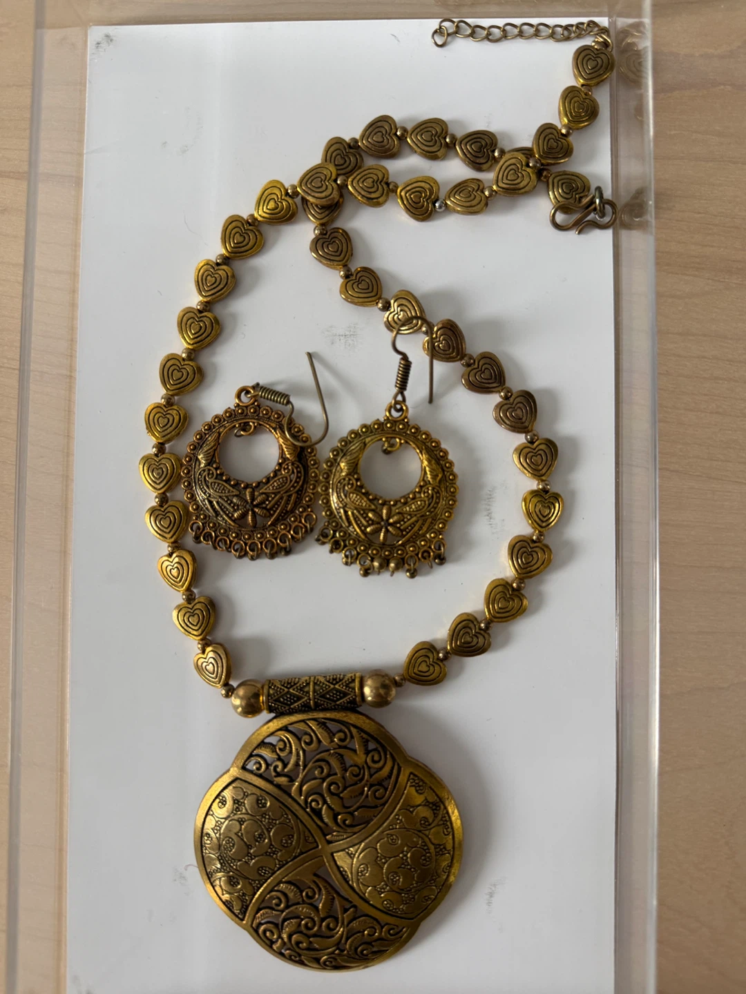 Gold tone heart beaded necklace and earring set