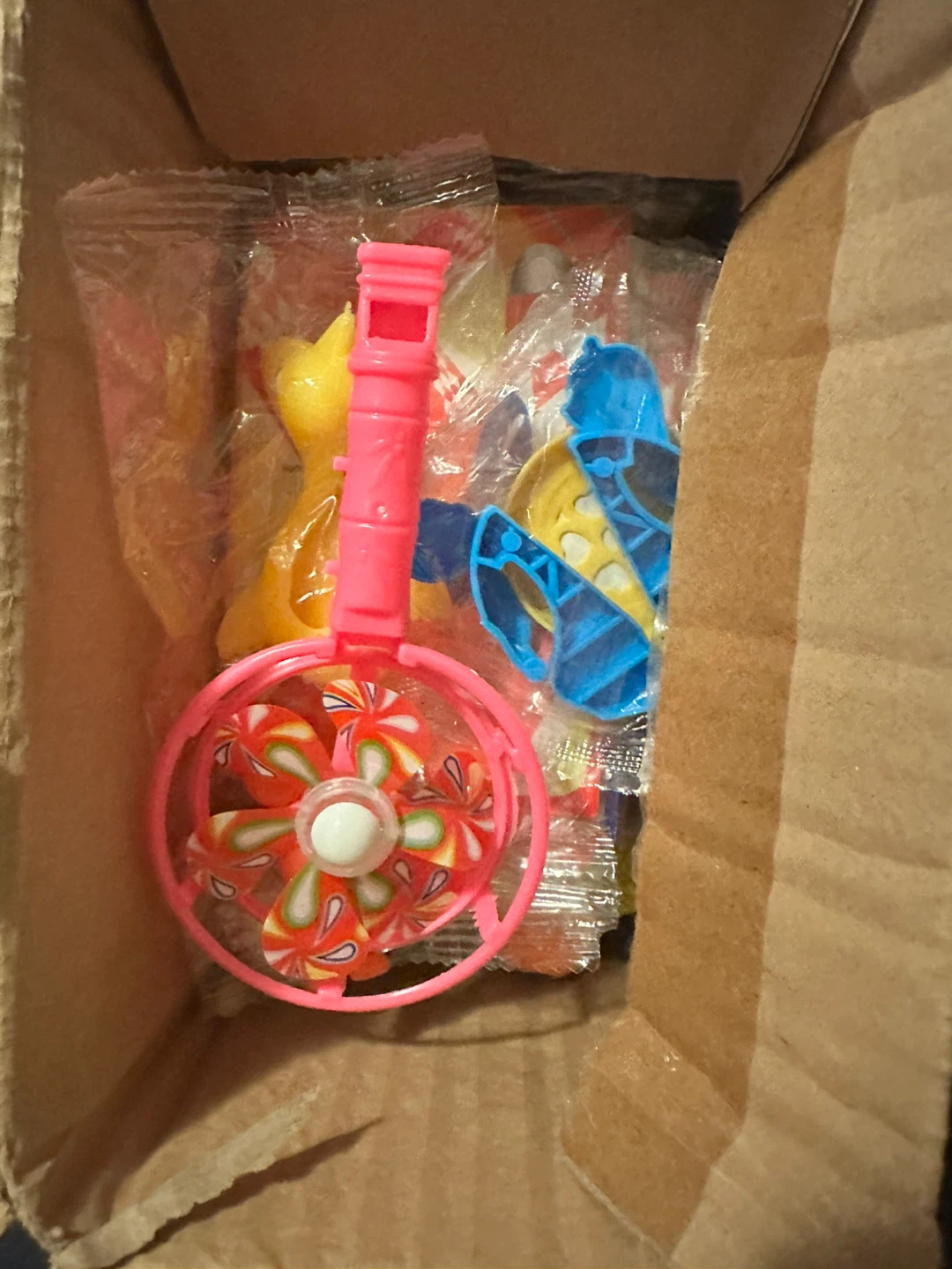 Assorted Toy Whistles and Spinners