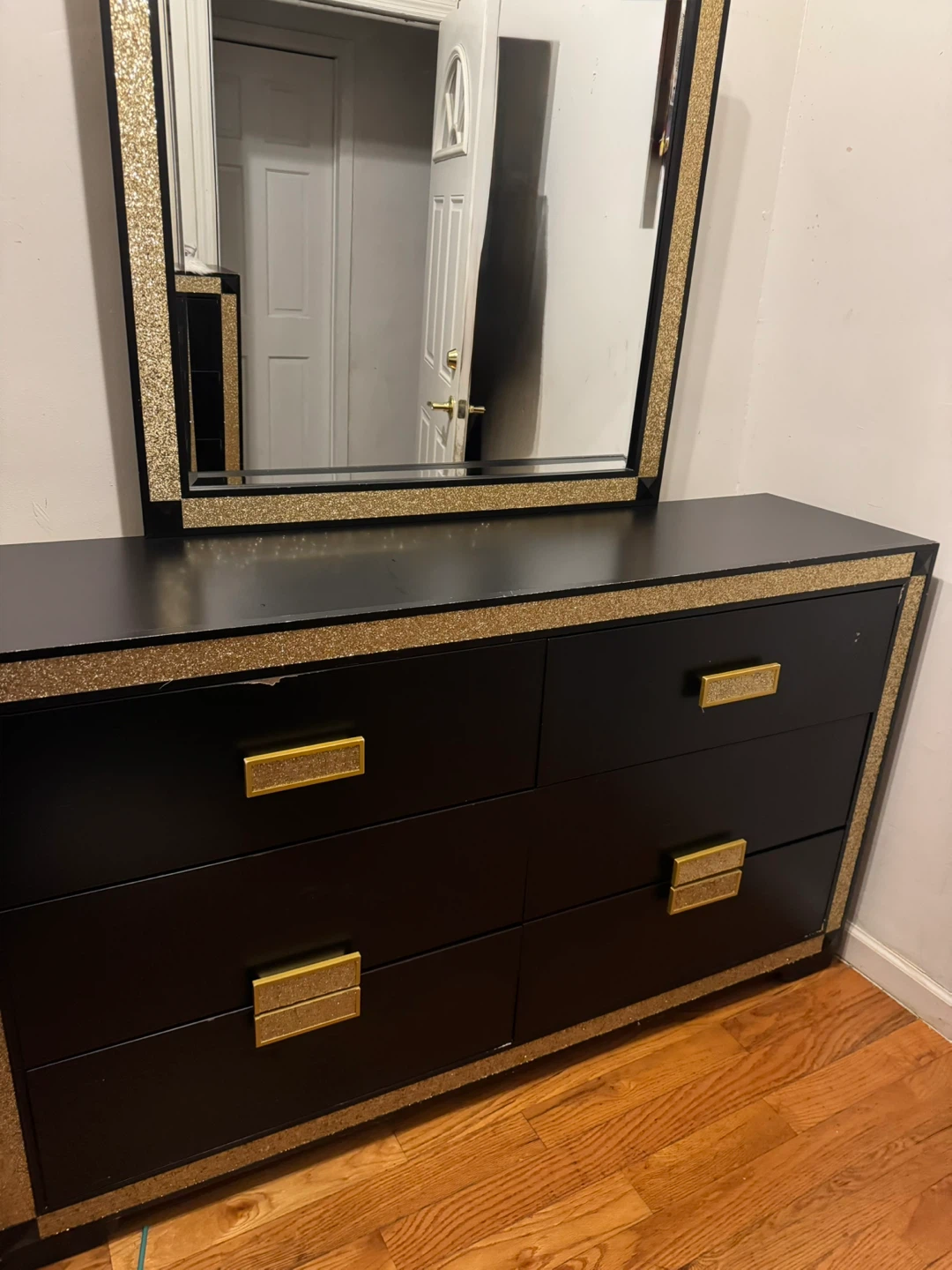 Black Dresser with Mirror and Bed Frame and a bedside table