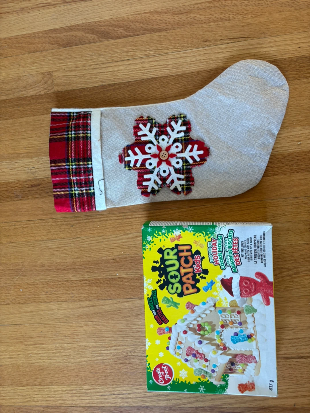 Christmas socks and Sour Patch Kids Holiday Cookie House Kit