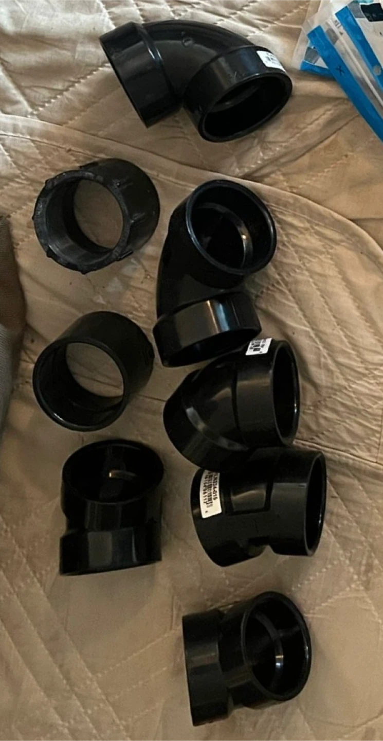Assorted Black PVC Pipe Fittings