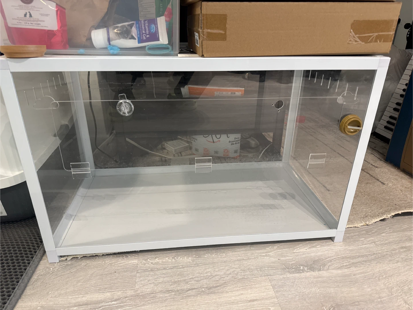 Two hamster cages