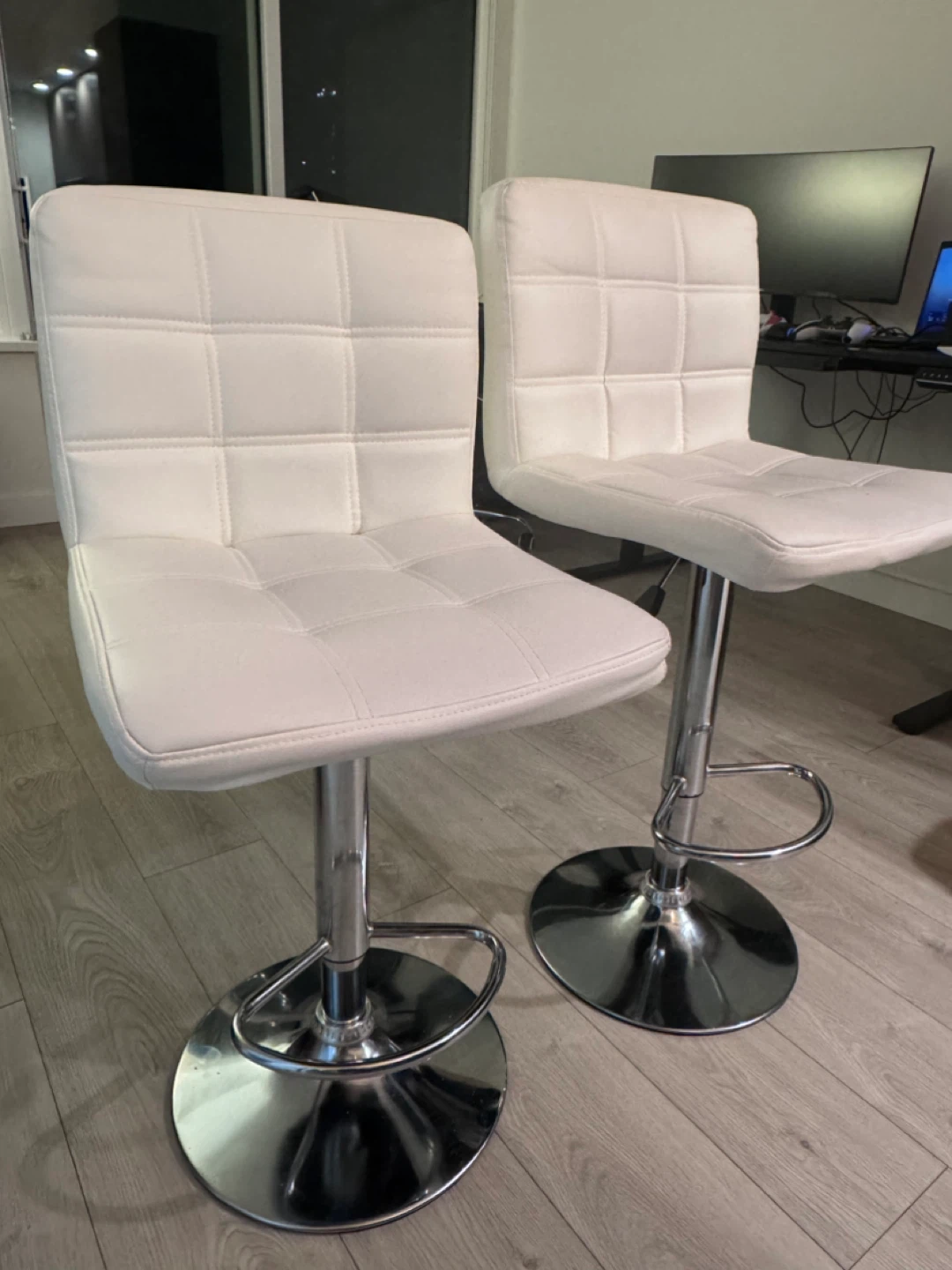 2 White Adjustable Bar Stools