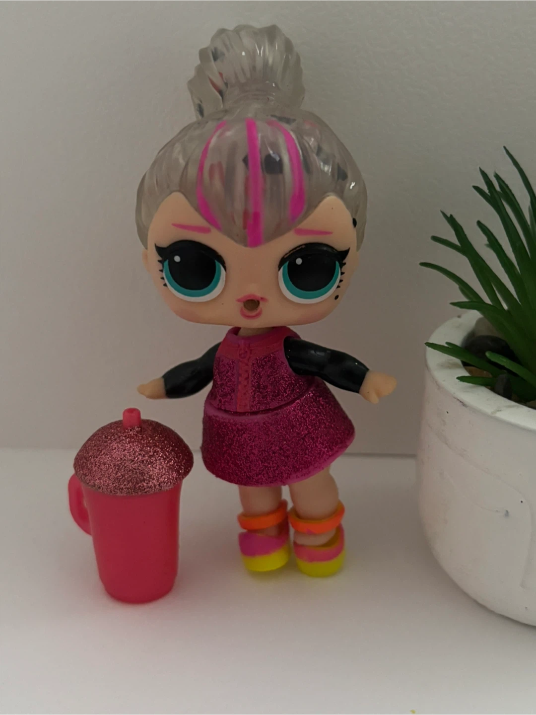 LOL Surprise Doll (including bottle and a headband)