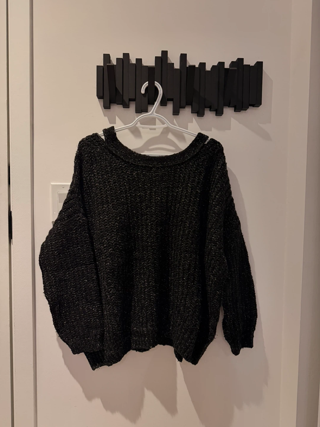Black Knit Sweater with cross back behind
