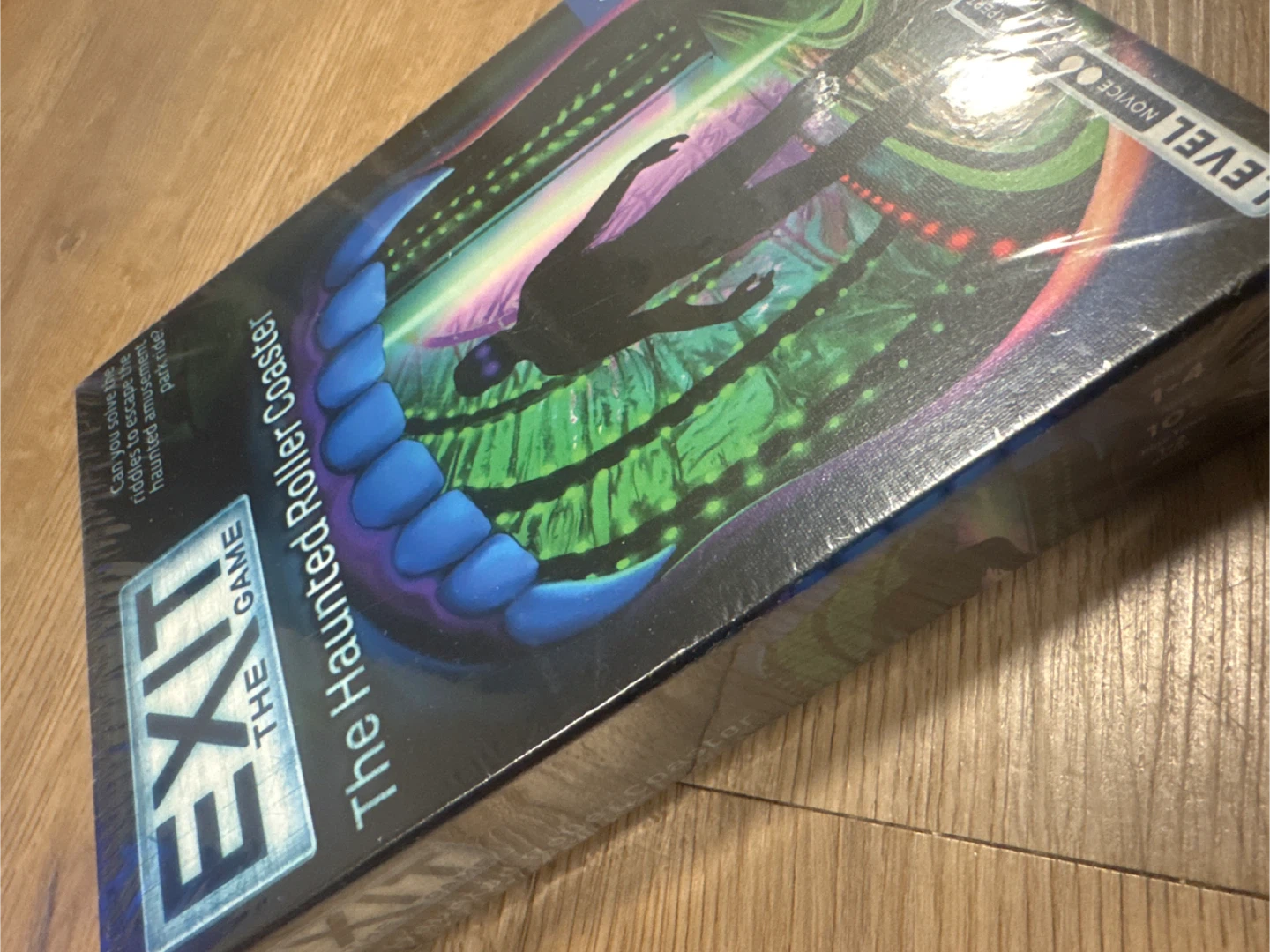 EXIT: The Game - The Haunted Roller Coaster Board Game - photo 2
