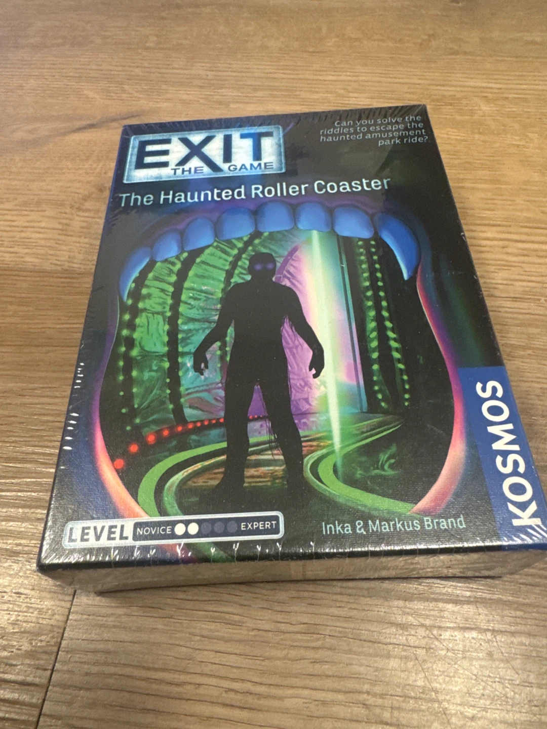 EXIT: The Game - The Haunted Roller Coaster Board Game