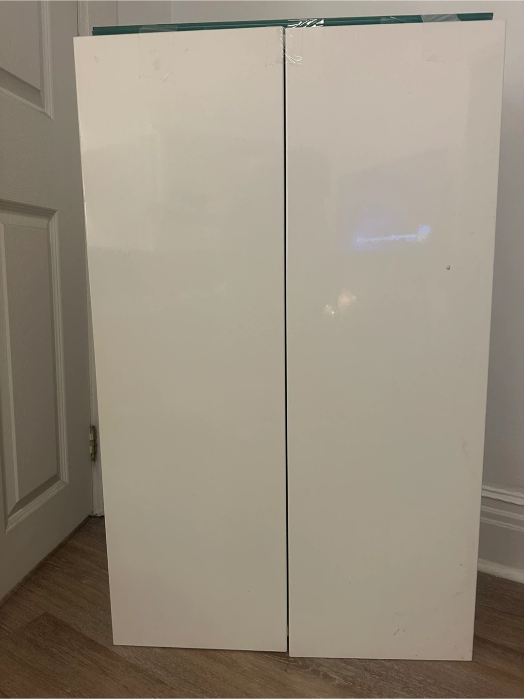IKEA White Two-Door Cabinet with Four-Glass Shelves