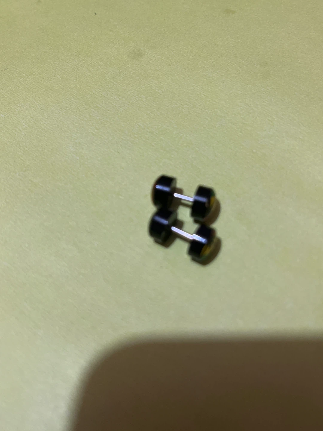 Pair of Black Dumbbell Earrings with Rasta Leaf Design - photo 3
