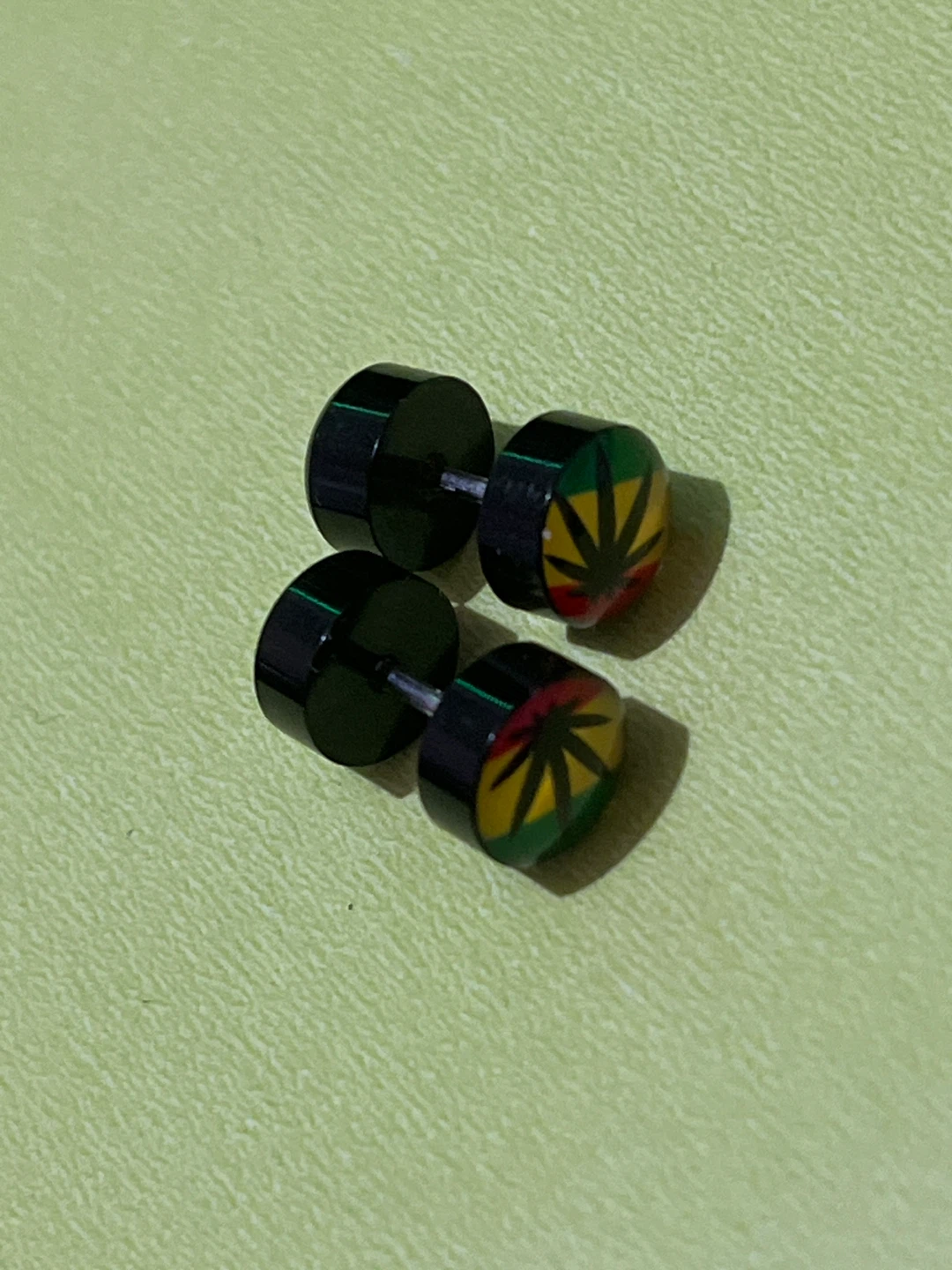 Pair of Black Dumbbell Earrings with Rasta Leaf Design - photo 2