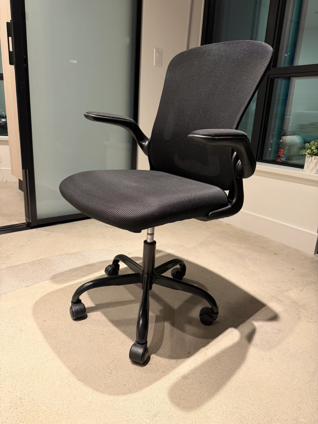 Black Ergonomic Mesh Office Chair with Padded Arms