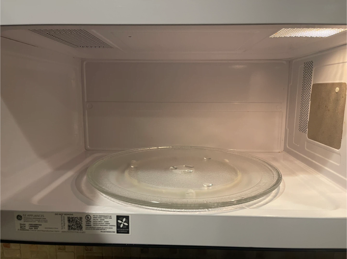 GE Over-the-Range Microwave - photo 2